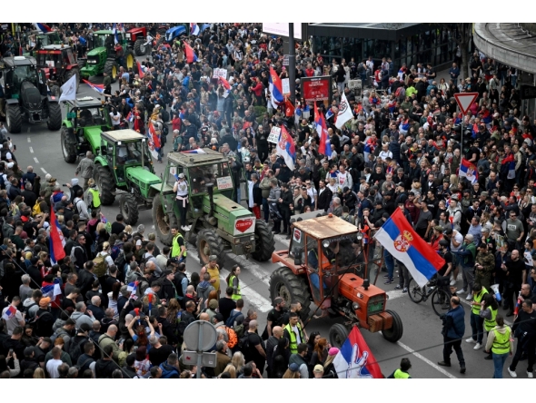 Farmers join protesters as they arrive in the capital from cities across Serbia, to take part in the largest protest since the anti-graft movement, in downtown Belgrade on March 15, 2025. (Photo by Andrej Isakovic / AFP)