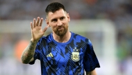 (Files) Argentina's forward Lionel Messi waves as he warms up before the 2026 FIFA World Cup South American qualification football match between Brazil and Argentina at Maracana Stadium in Rio de Janeiro, Brazil, on November 21, 2023. (Photo by Carl De Souza / AFP)