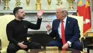 US President Donald Trump and Ukraine's President Volodymyr Zelensky meet in the Oval Office of the White House in Washington, DC, February 28, 2025. (Photo by Saul Loeb / AFP)

