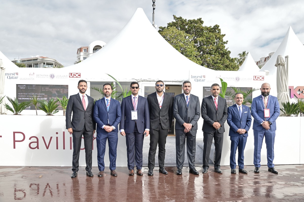 Invest Qatar and Aqarat officials pose for a group photo during the MIPIM 2025.