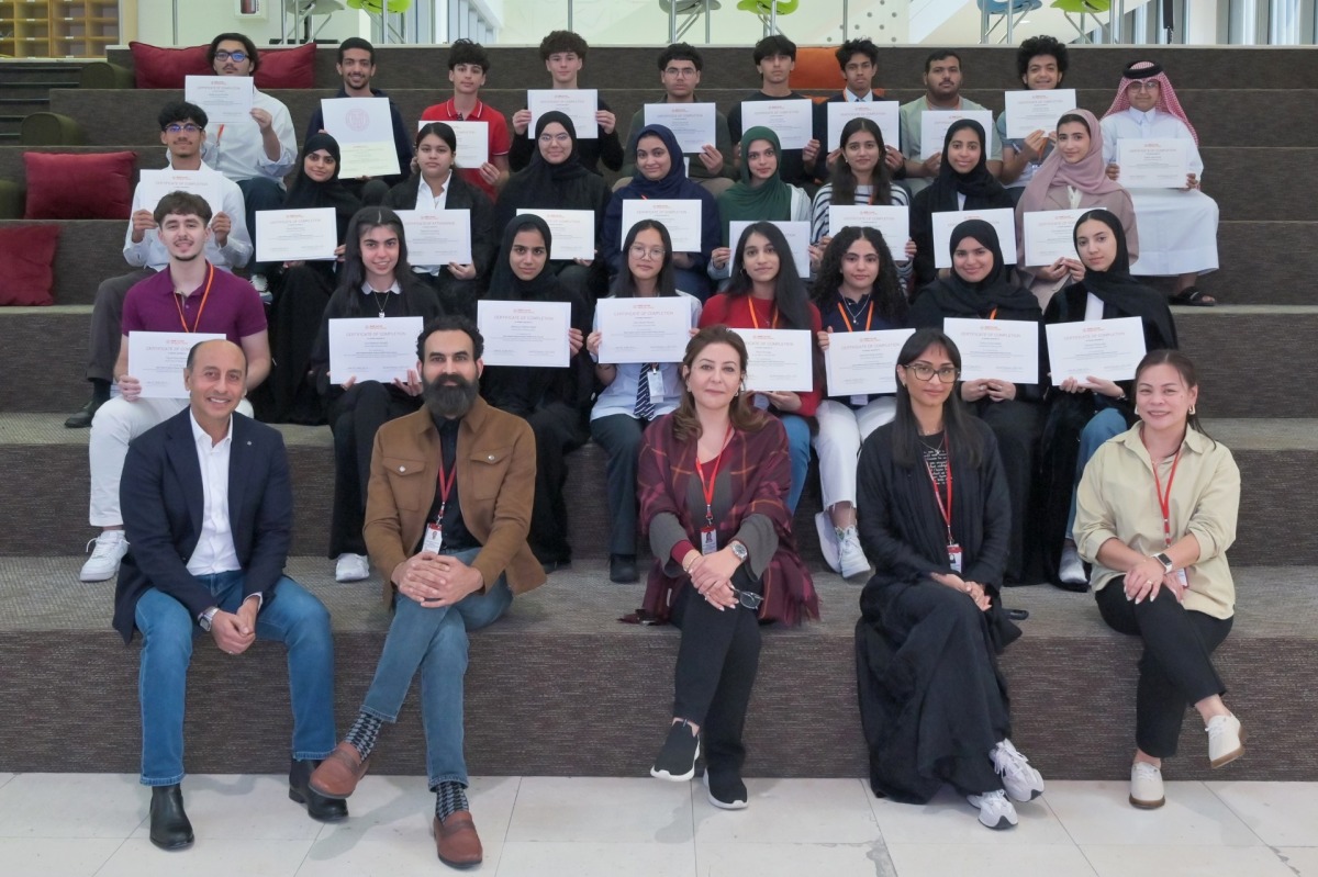 Members of WCM-Q’s Office of Student Outreach & Educational Development with high school students who completed the Qatar Medical Explorer Program.