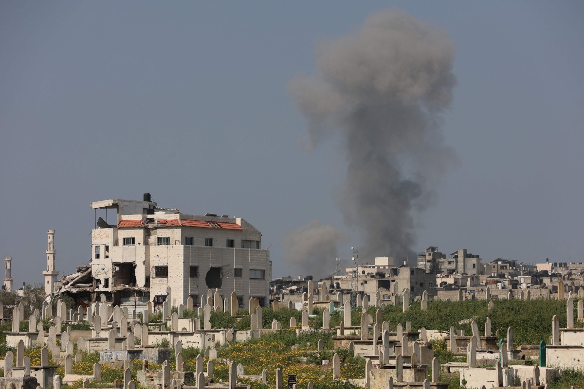 Smoke billows during Israeli strikes west of Gaza City on March 18, 2025. (Photo by Omar AL-QATTAA / AFP)
