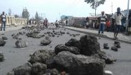 Demonstrators placed rocks to block roads during a protest in Goma on September 19, 2016. At least 17 people, mostly civilians, were killed on September 19, 2016 when clashes erupted ahead of a planned opposition rally in the Congolese capital Kinshasa, a