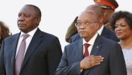 South Africa's Deputy President Cyril Ramaphosa and President Jacob Zuma stand during the playing of the national anthem at the opening of Parliament in Cape Town, in this February 11, 2016 file photo. (REUTERS/Mike Hutchings/Files)