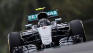 Mercedes AMG Petronas F1 Team's German driver Nico Rosberg drives during the qualifying session of the Formula One Malaysian Grand Prix in Sepang on October 1, 2016. / AFP / PEDRO UGARTE