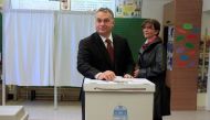 Hungary's Prime Minister Viktor Orban casts his ballot next to his wife Aniko Levai inside a polling station during a referendum on EU migrant quotas in Budapest, Hungary, October 2, 2016. (Bernadett Szabo / Reuters)