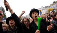 Woman shout slogans as they gather in an abortion rights campaigners' demonstration to protest against plans for a total ban on abortion in front of the ruling party Law and Justice (PiS) headquarters in Warsaw, Poland October 3, 2016. REUTERS/Kacper Pemp