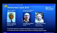 A screen showing pictures of the winners of the 2016 Nobel Prize for Physics during a news conference by the Royal Swedish Academy of Sciences in Stockholm, Sweden October 4, 2016. From left: David Thouless, Duncan Haldane and Michael Kosterlitz. (TT News