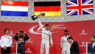 Mercedes' driver Nico Rosberg of Germany celebrates winning the race. (Reuters/Toru Hanai)