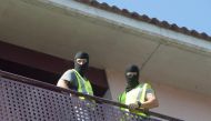 Spanish Civil Guard officers take part in a search at the residence of a Moroccan suspect who was arrested during an operation against terror in Arbucies, Spain, 27 July 2016.