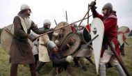 Re-enactors participate in a demonstration before a re-enactment of the the Battle of Hastings on the 950th anniversary of the battle, in Battle, Britain October 15, 2016. REUTERS/Neil Hall