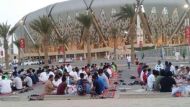 (File Photo) Saudi Fans break the Ashura fast before the match outside Al Jawhara Stadium, October 11, 2016. Source: twitter.com/mahdi1052