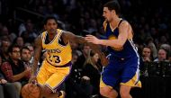 Los Angeles Lakers guard Lou Williams (23) drives the ball defended by Golden State Warriors guard Klay Thompson (11) during the fourth quarter at Staples Center. Kelvin Kuo-USA TODAY Sports