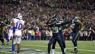 Seattle Seahawks safety Earl Thomas (29) celebrates with safety Kelcie McCray (33) after a Buffalo Bills incomplete pass on fourth down with 13 seconds left as Bills receiver Robert Woods (10) reacts during a NFL football game at CenturyLink Field. Kirby 