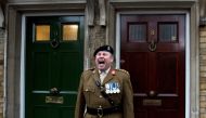 Parade Marshall Captain Gary Tomlin gives a command during a Remembrance Sunday parade through Fulham in West London, Britain November 8, 2009. REUTERS/Kevin Coombs