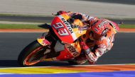 Repsol Honda's Spanish rider Marc Marquez rides during the Moto GP third Free practice session ahead of the Motul Comunidad Valenciana Grand Prix at the Ricardo Tormo racetrack in Cheste, on November 12, 2016. / AFP / JOSE JORDAN
