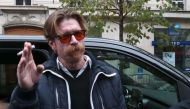 Singers Jesse Hughes of US rock group Eagles of Death Metal arrives near the Bataclan concert hall in Paris on November 13, 2016, for a ceremony to mark the first anniversary of the Paris terror attacks. 130 people were killed on November 13, 2015 by gunm