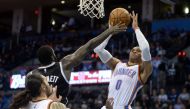 Oklahoma City Thunder guard Russell Westbrook (0) shoots the ball over Brooklyn Nets forward Anthony Bennett (13) during the fourth quarter at Chesapeake Energy Arena. / Mark D. Smith