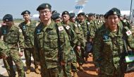 Members of the Japanese Ground Self-Defence Force (GSDF) arrive at the airport in Juba, South Sudan, on November 21, 2016. AFP / SAMIR BOL
