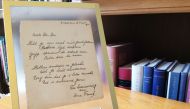 This photo taken on November 21, 2016 at the Bubb Kuyper auction house in Haarlem shows a rare handwritten poem by Anne Frank, penned shortly before she went into hiding from the Nazis, addressed to 