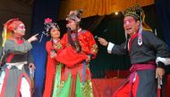 This photo taken on November 19, 2016 shows actors from the Jinyuan Opera Company performing in a temple in White Horse town in Daying, in China's southwest Sichuan province. AFP / STR 