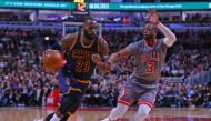 Cleveland Cavaliers forward LeBron James (23) drives past Chicago Bulls guard Dwyane Wade (3) during the second half at the United Center. Chicago won 111-105. Dennis Wierzbicki
