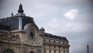 (FILES) This file photo taken on June 15, 2015 shows the Orsay museum and the Eiffel tower in Paris.  AFP / JOEL SAGET
