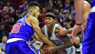 Boston Celtics guard Isaiah Thomas (4) and Philadelphia 76ers guard Timothe Luwawu-Cabarrot (20) battle for the ball during the second quarter at Wells Fargo Center. Eric Hartline\USA TODAY Sports