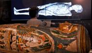 A young boy looks at a three-dimensional image of a CT scan of an Egyptian mummy as the the hidden secrets of Egyptian mummies up to 3,000 years old have been virtually unwrapped and reconstructed for the first time using cutting-edge scanning technology 