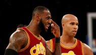 LeBron James #23 of the Cleveland Cavaliers points to his eye after he was hit in the first half against the New York Knicks at Madison Square Garden on December 7, 2016 in New York City. AFP
