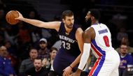 Marc Gasol #33 of the Memphis Grizzlies looks to make a move against Andre Drummond #0 of the Detroit Pistons during the second half at the Palace of Auburn Hills on December 21, 2016 in Auburn Hills, Michigan. Memphis won the game 98.86. Gregory Shamus/A