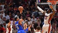 Oklahoma City Thunder guard Russell Westbrook (0) shoots against the Miami Heat during the second half at American Airlines Arena. Jasen Vinlove