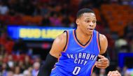 Russell Westbrook  of the Oklahoma City Thunder dribbles the ball during their NBA  game against the Miami Heat at American Airlines Arena in Miami, Florida, USA on Tuesday. 