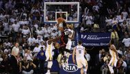 Kevin Durant #35 of the Golden State Warriors blocks a shot taken by DeMar DeRozan #10 of the Toronto Raptors at ORACLE Arena on December 28, 2016 in Oakland, California. Ezra Shaw/AFP