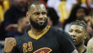 Cleveland Cavaliers forward LeBron James (23) reacts after a confrontation with Boston Celtics guard Marcus Smart (36) during the second half at Quicken Loans Arena. The Cavs won 124-118. Mandatory Credit: Ken Blaze-USA TODAY Sports