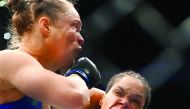 Amanda Nunes (right) punches Ronda Rousey during their UFC 207 match at T-Mobile Arena in Las Vegas, Nevada, in US on Friday.