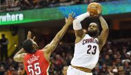 Cleveland Cavaliers forward LeBron James (23) shoots over the defense of New Orleans Pelicans guard E'Twaun Moore (55) during the second half at Quicken Loans Arena. Ken Blaze-USA TODAY Sports