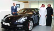 Salman Jassem Al Darwish (second right), Chairman & CEO of Porsche Centre Doha, Al Boraq Automobiles, and other officials at the new Porsche Panamera launch event held at the Porsche Centre Doha. Pic: Qassim Rahmatullah / The Peninsula