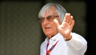 (FILES) This file photo taken on June 18, 2016 shows Formula 1 boss Bernie Ecclestone walking in the paddock at the Baku City Circuit, in Baku, one day ahead of the European Formula One Grand Prix. AFP / ANDREJ ISAKOVIC
