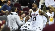 Cleveland, OH, USA; Cleveland Cavaliers forward LeBron James (23) celebrates with guard Kyrie Irving (2) after leaving the game during the second half against the Brooklyn Nets at Quicken Loans Arena. The Cavs won 124-116. Ken Blaze
