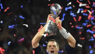 Tom Brady #12 of the New England Patriots holds the Vince Lombardi Trophy after defeating the Atlanta Falcons 34-28 in overtime during Super Bowl 51 at NRG Stadium on February 5, 2017 in Houston, Texas. AFP / Timothy A. CLARY
