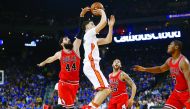 Golden State Warriors guard Klay Thompson (centre) in action against Chicago Bulls during their NBA game at Oracle Arena yesterday.