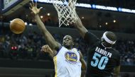 Golden State Warriors forward Draymond Green (23) loses control of the ball as Memphis Grizzlies forward Zach Randolph (50) defends in the second half at FedExForum. Golden State defeated Memphis 122-107.  Credit: Nelson Chenault
