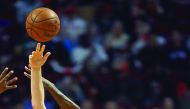 Kelly Olynyk (41) of the Boston Celtics gets off a pass under presure from Bobby Portis (5) of the Chicago Bulls at the United Center in Chicago, Illinois on Thursday.