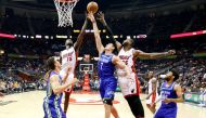 Atlanta Hawks forward Ersan Ilyasova (7) battles for a rebound against Miami Heat forward Okaro White (15) and forward Willie Reed (35) in the fourth quarter at Philips Arena. The Heat won 108-90. Brett Davis
