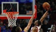 Dwyane Wade #3 of the Chicago Bulls goes up for a dunk over Alex Len #21 of the Phoenix Suns at the United Center on February 24, 2017 in Chicago, Illinois. Jonathan Daniel/AFP
