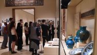 People listen to curators at the Metropolitan Museum of Art February 24, 2017 as ten-minute gallery talks are given in the permanent collection created in the lands that are now Iraq, Syria, Iran and Yemen. AFP / TIMOTHY A. CLARY 