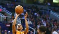 Tyler Ulis (left) of the Phoenix Suns attempts a shot against the Boston Celtics during their  NBA game at Talking Stick Resort Arena on Sunday. 