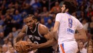 San Antonio Spurs forward Kawhi Leonard (2) moves to the basket in front of Oklahoma City Thunder guard Alex Abrines (8) during the third quarter at Chesapeake Energy Arena. Mark D