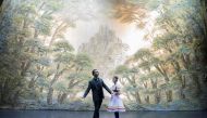 French dancer Laurent Hilaire, the new artistic director of Moscow's Stanislavsky Music Theatre ballet troupe, speaks with a ballerina ahead of the theatre's performance of Giselle in Moscow on February 23, 2017. AFP / Natalia KOLESNIKOVA 